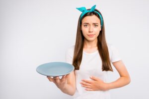 girl with empty stomach