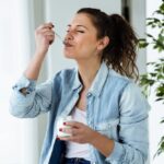 woman eating an edible