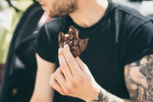 man eating edible