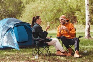 eating sandwiches at campsite